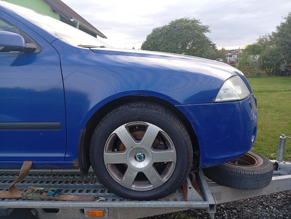 Škoda Octavia II přední blatníky