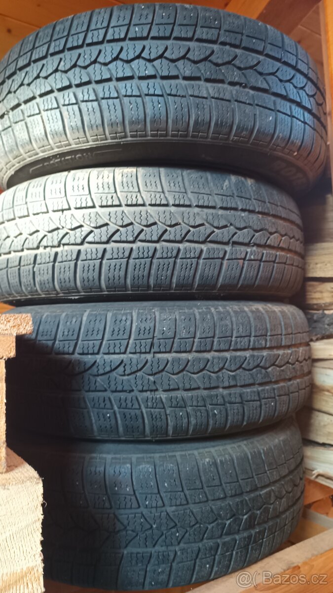 Zimní pneumatiky 175/65 R14 82T a plechová kola