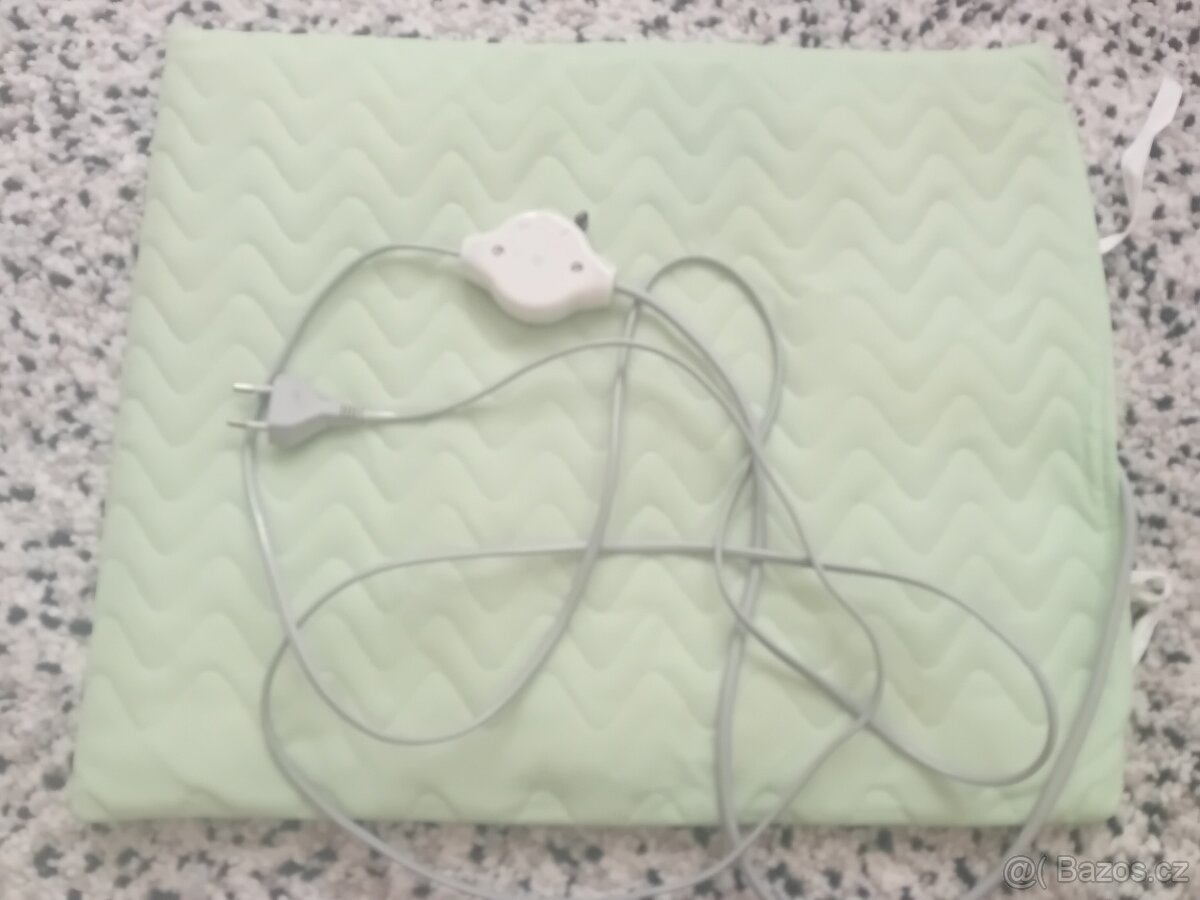 Elektrická nahřívací dečka z chalupy po babičce