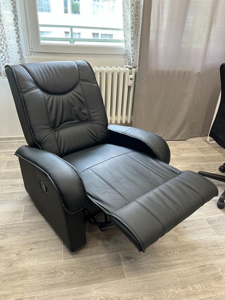 Polohovací křeslo