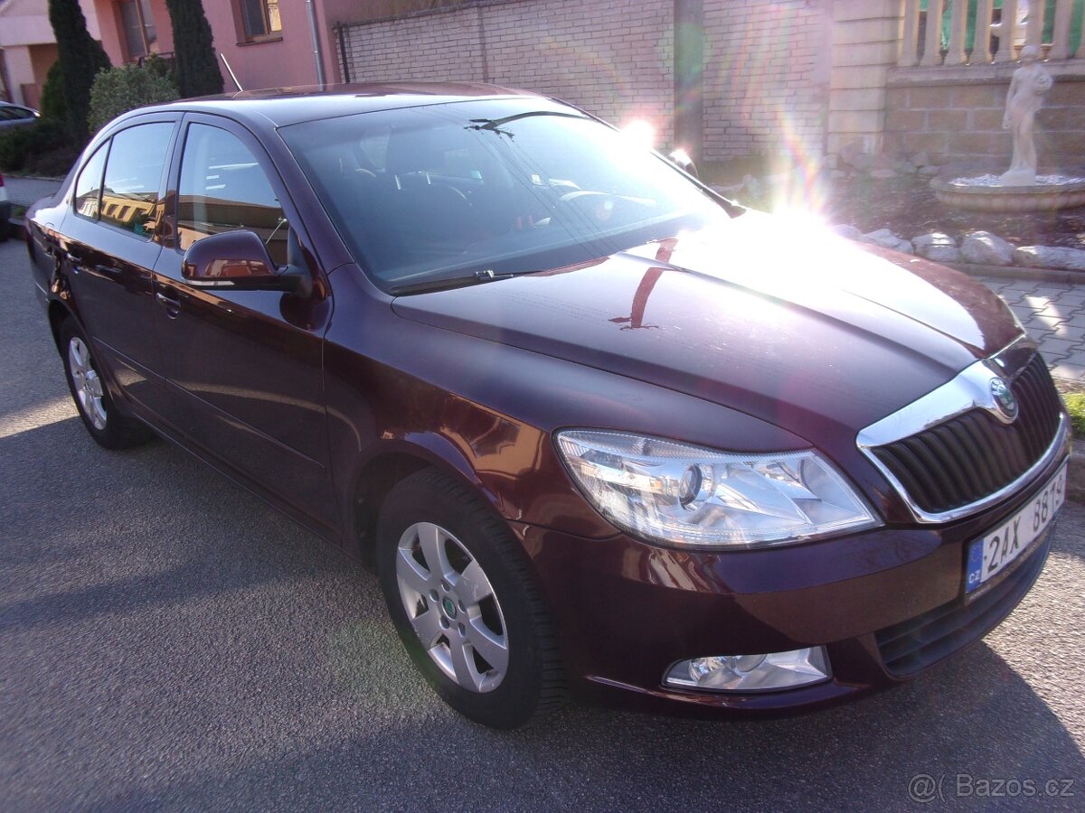 Škoda Octavia 1,6TDi 77kW,koupeno v čr 5.2012 krátká