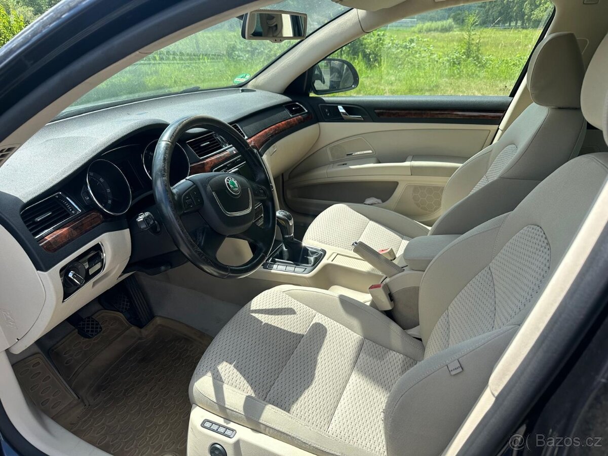 Škoda Superb 2 sedačky.