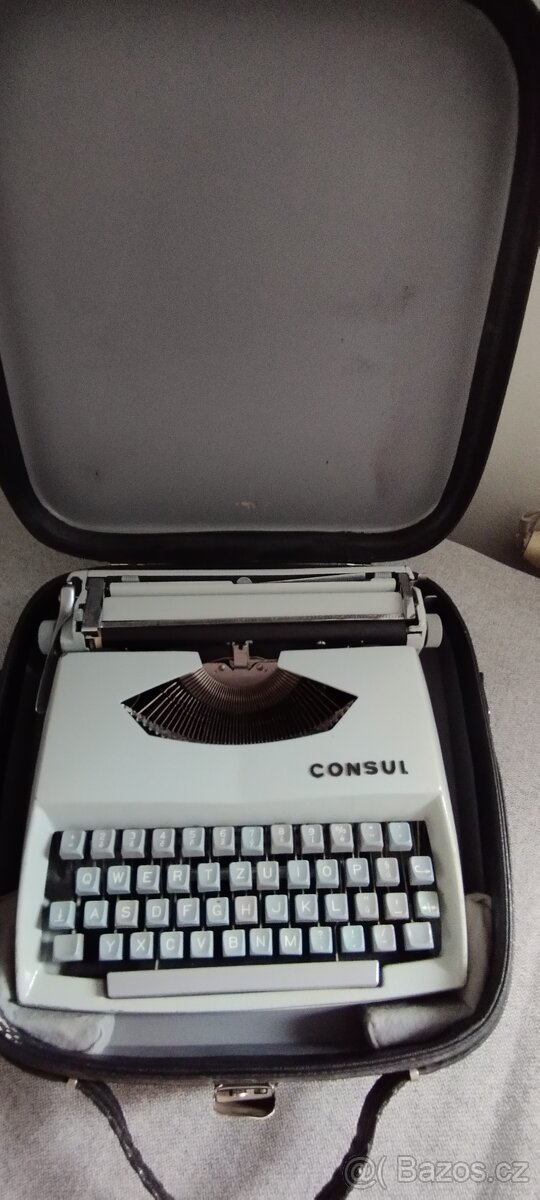 Kufříkový psací stroj