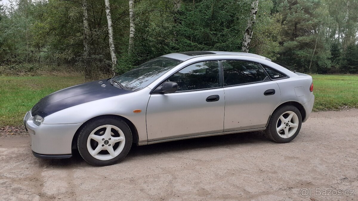 Mazda 323f 1,5i 16V stk do9/2026,EKO placeno