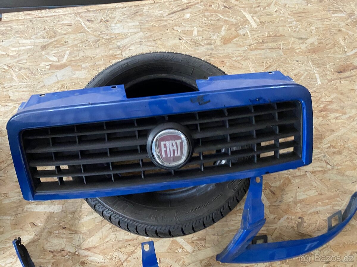 FIAT DOBLO 2005-2010 MASKA VČETNĚ ZNAKU