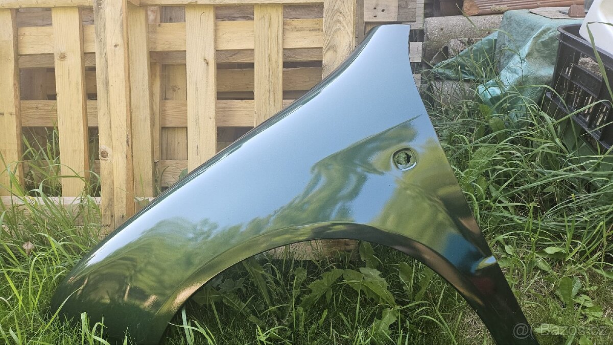 Levý přední blatník Škoda Fabia1.4