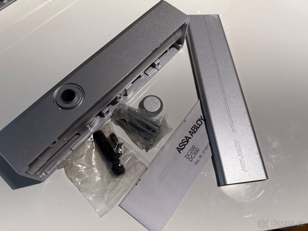 Dveřní otvírač horní Assa Bloy