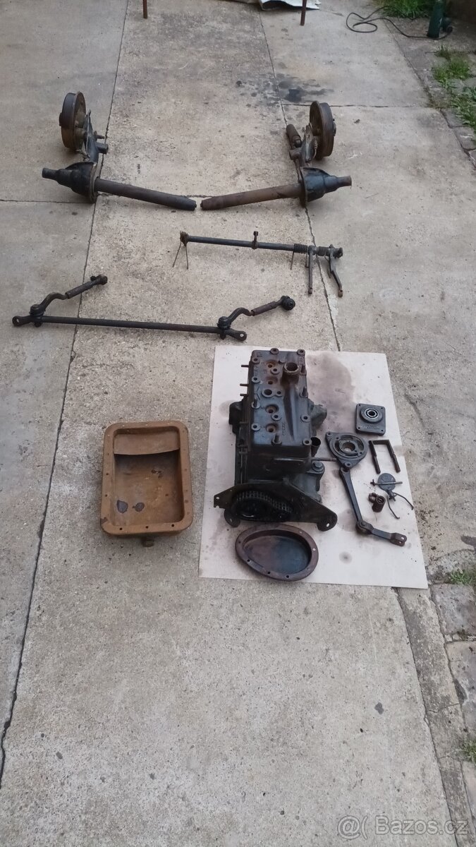 Motor, nádrž, náprava + další díly Adler Triumph