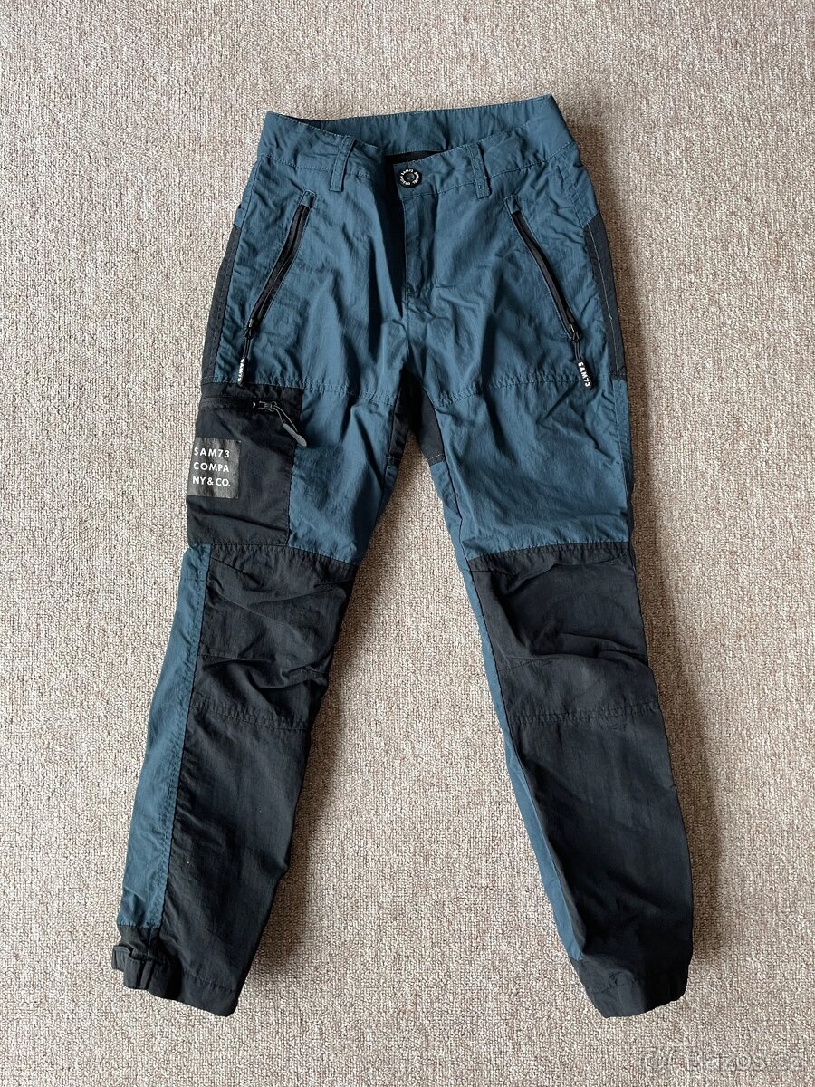 Prodám kalhoty vel.140