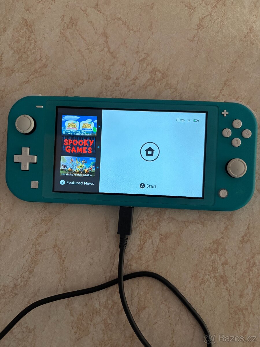 Nintendo Switch Lite Turquoise (světle tyrkysová) + 4 hry