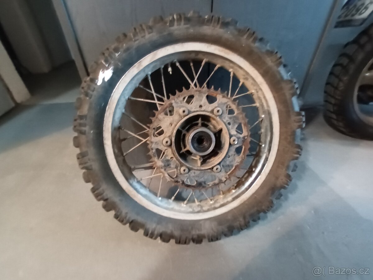 Prodám zadní kolo na HONDA DOMINÁTOR + další díly