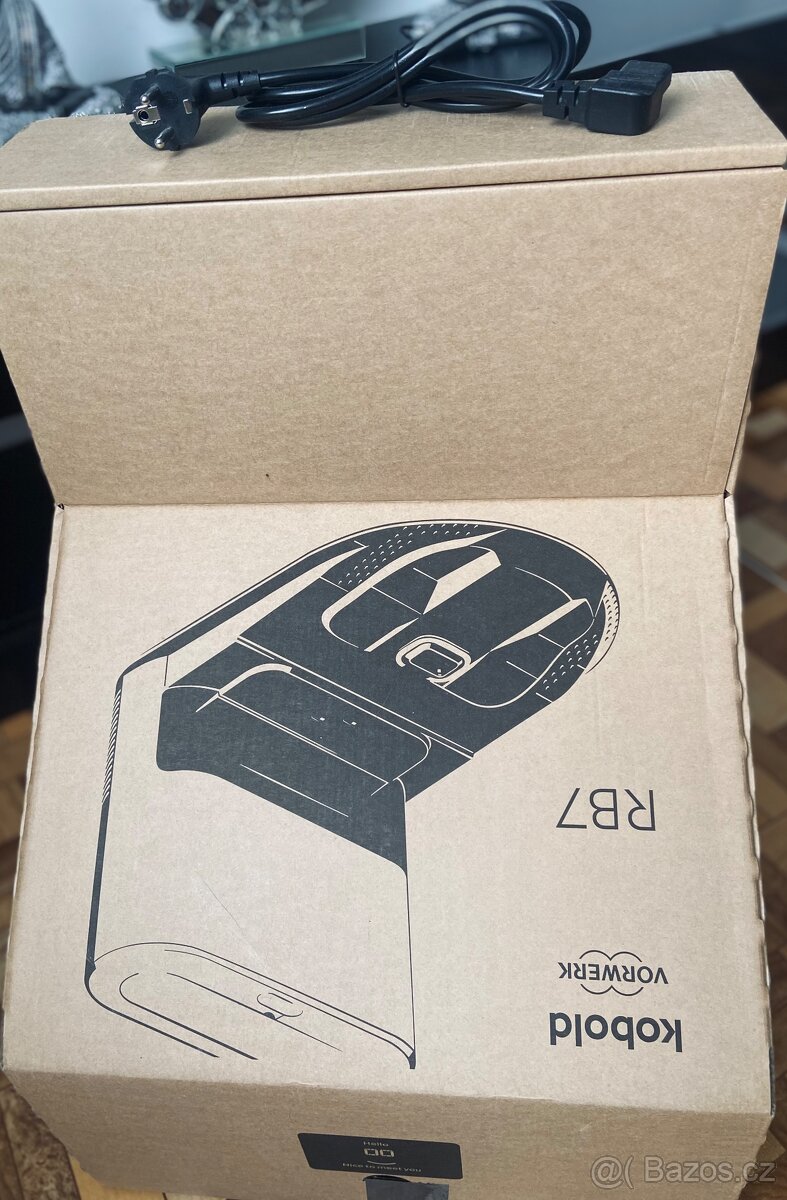 Robot VR7 s vyprazdňovací základnou