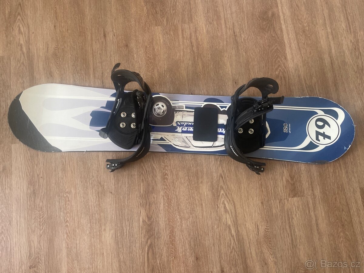 Snowboard a boty k tomu