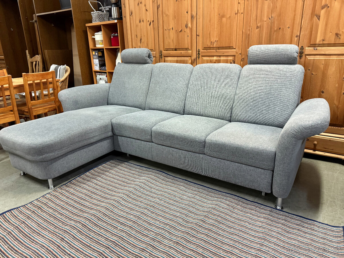 Rohová rozkládací šedá sedačka 260 x 160cm