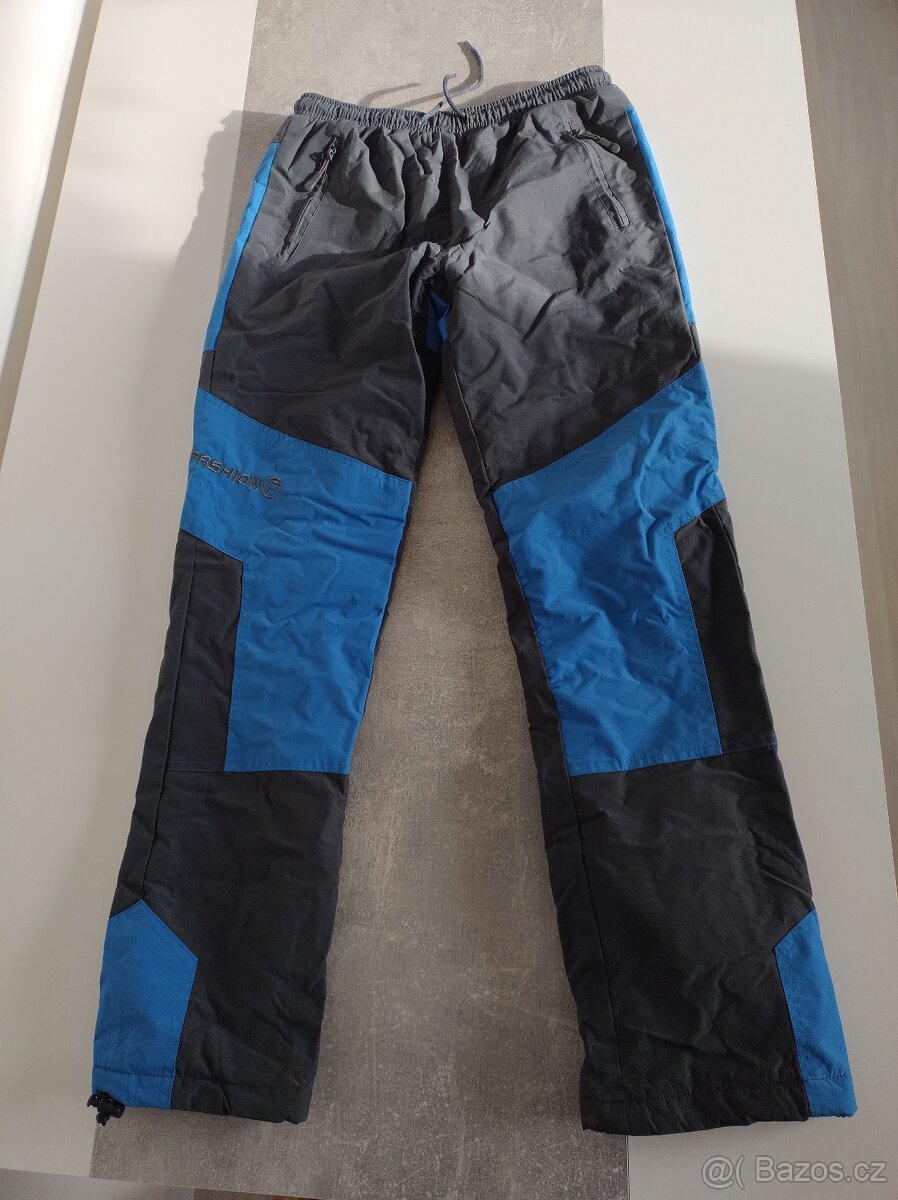 Prodám zimní kalhoty Grace vel. 164