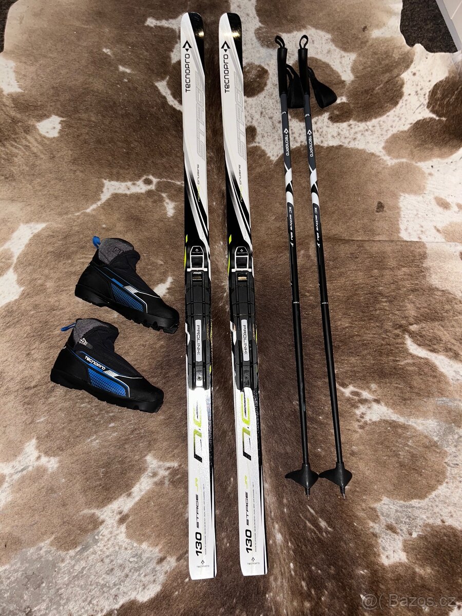 Nové Běžky Tecno Pro 130 cm,hůlky 105 cm,boty vel.34 NNN