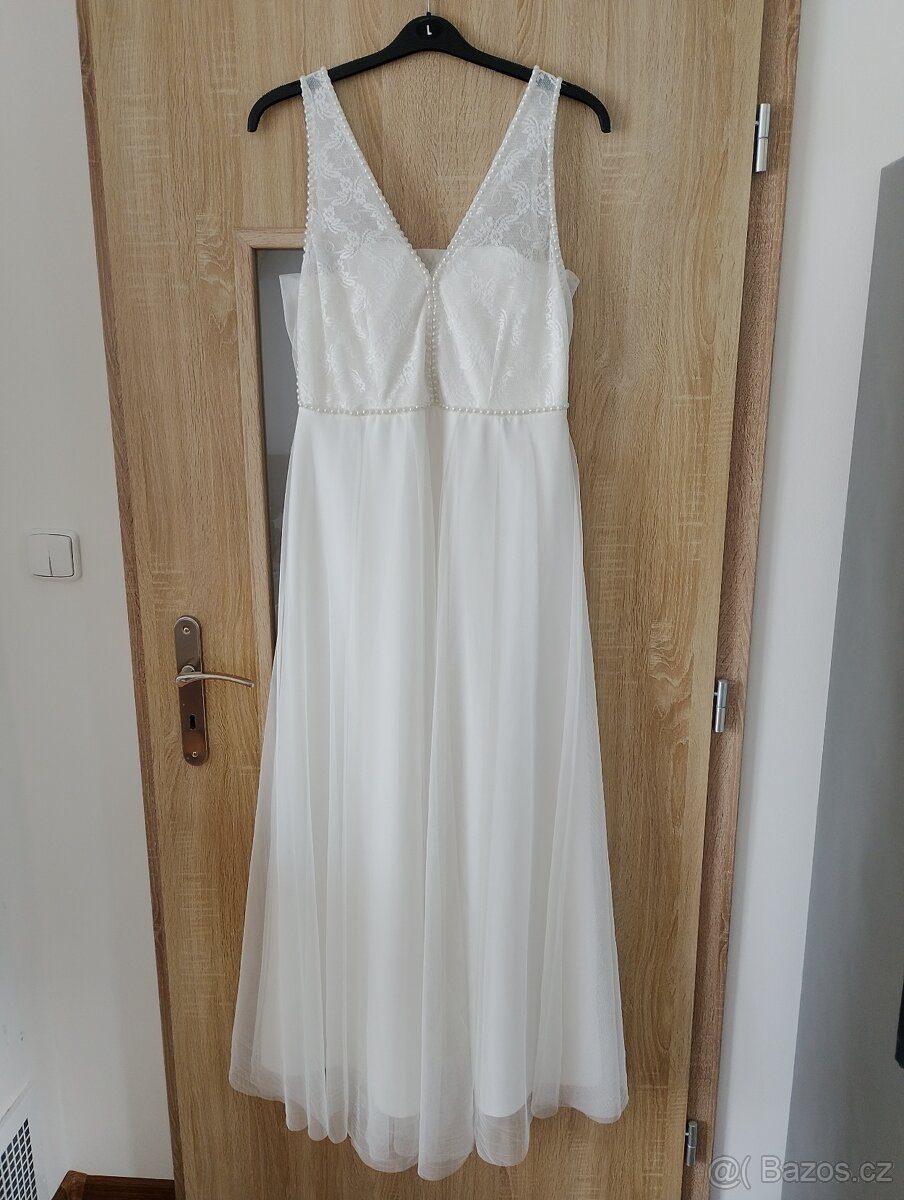 Svatební šaty vel.44
