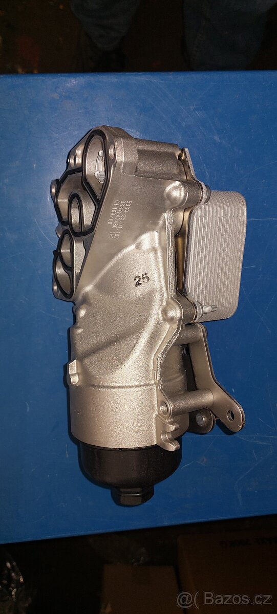 Držák olej.filtru 1103S7