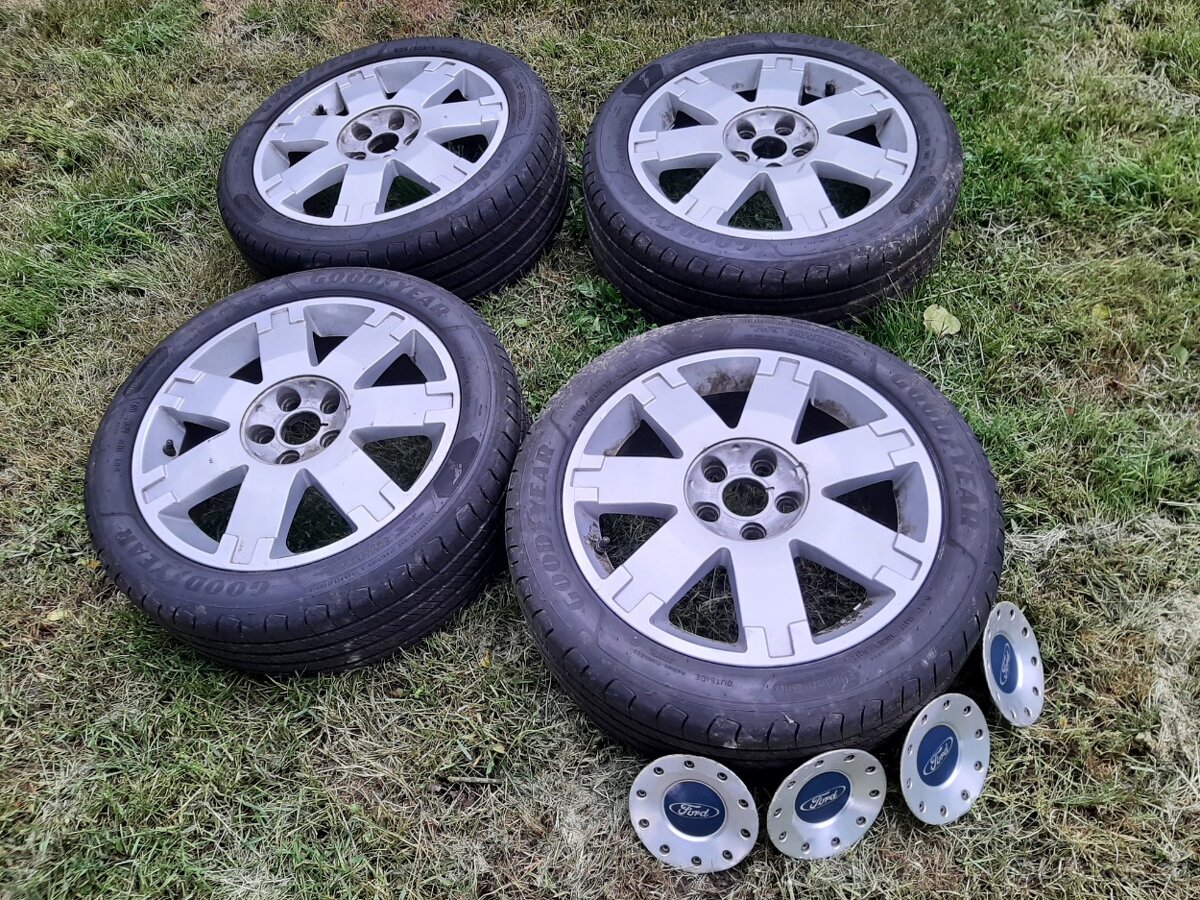Lité disky s pneu pro Ford Mondeo MK3