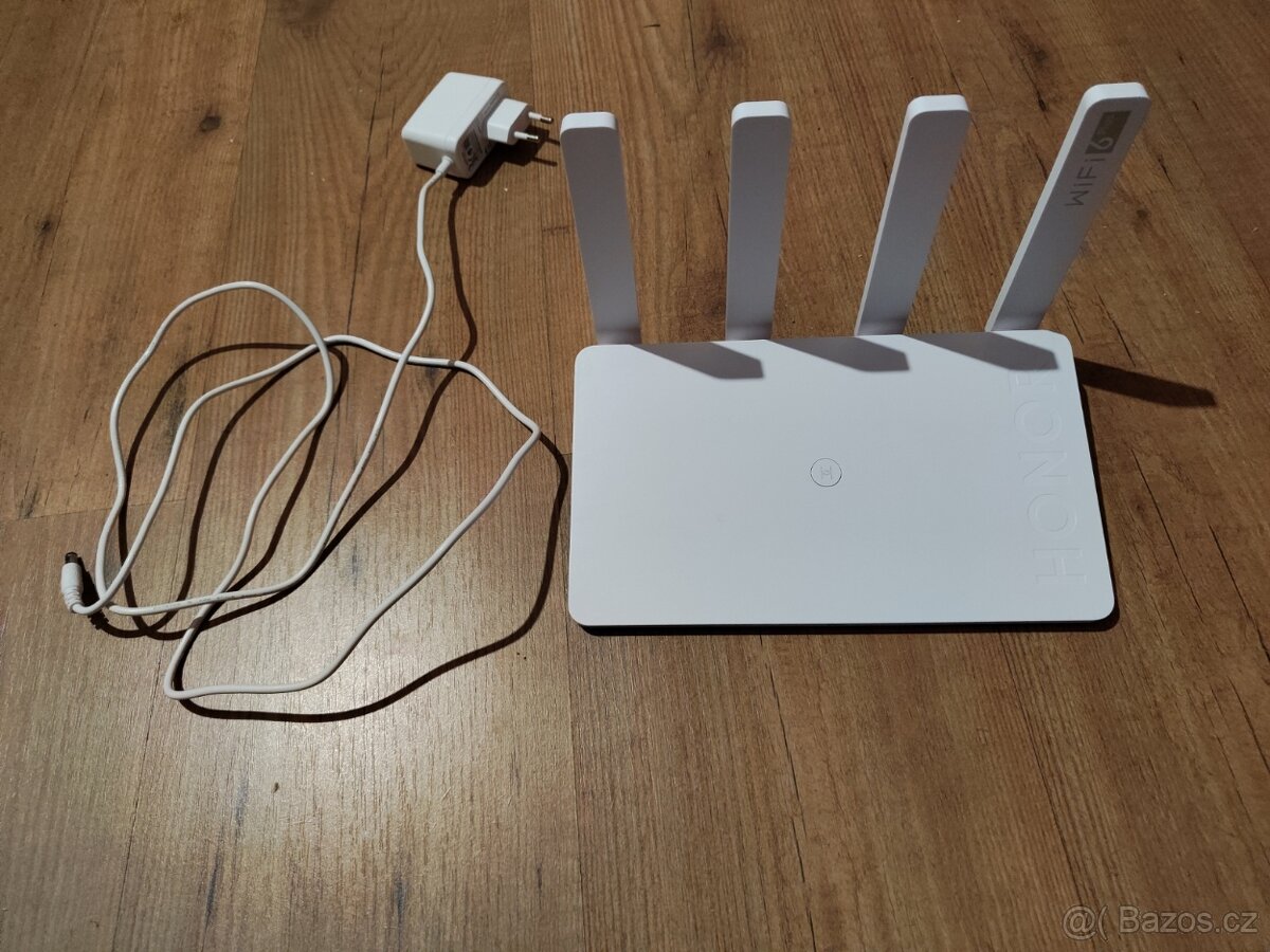 Wifi routery HONOR 3 Wi-Fi 6 Plus a TP-Link Archer C50