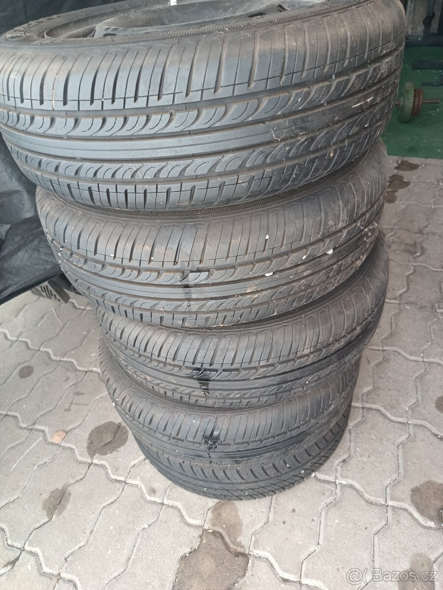 Disky s pneu Mazda 2 2007