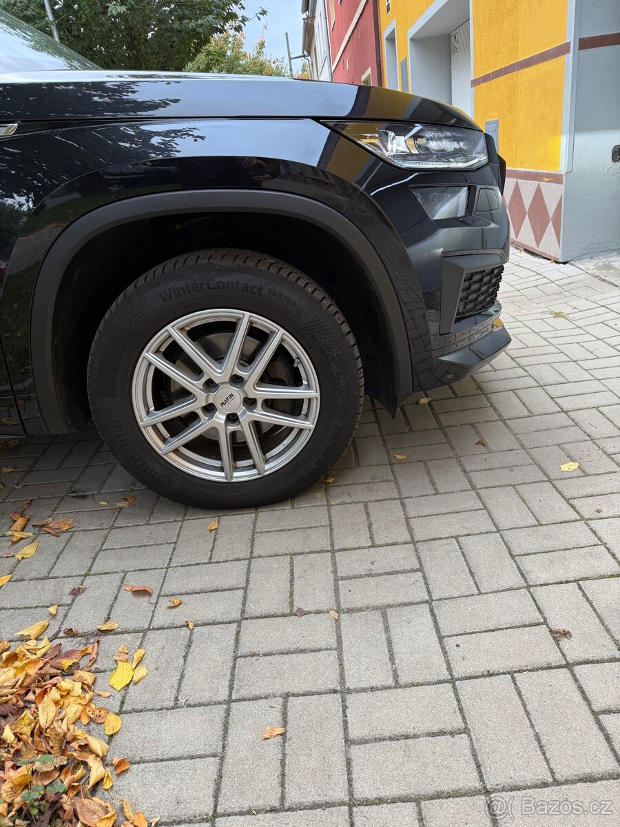 Alu 5x115 na zimních gumách.