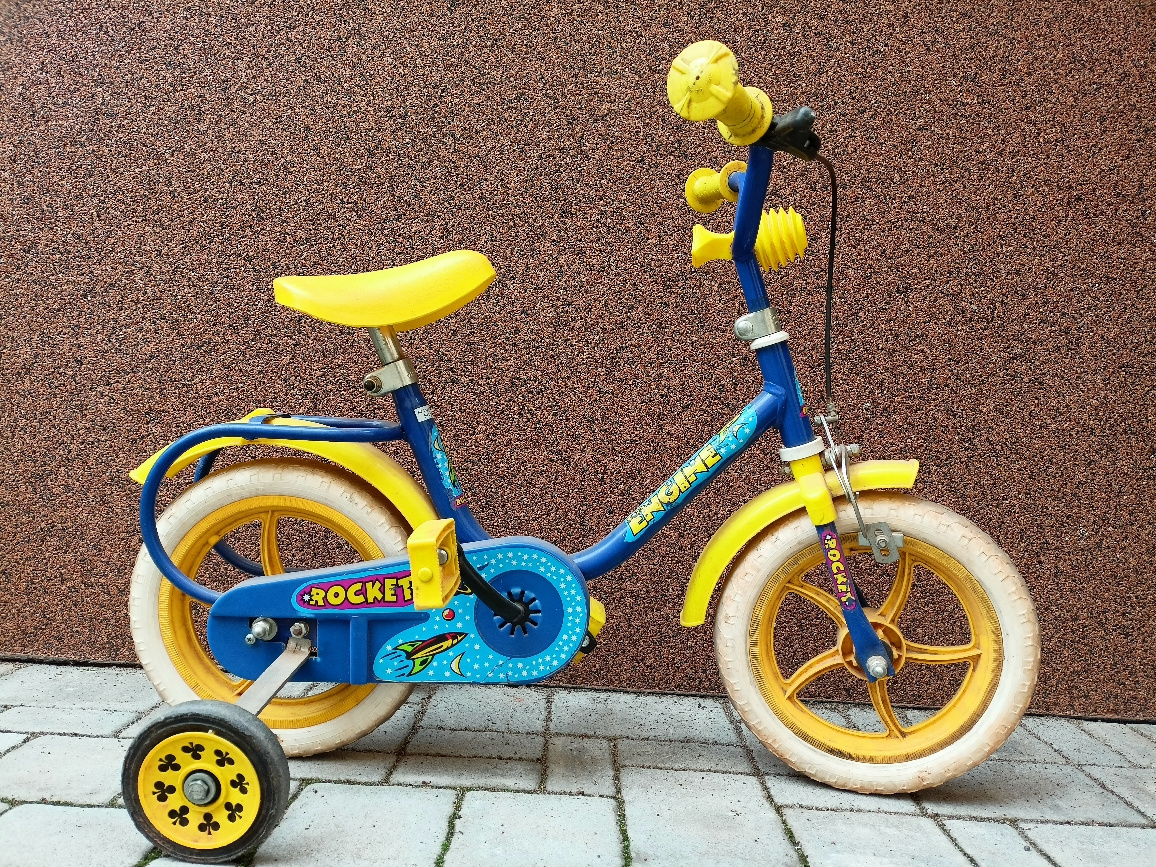 Dětské kolo s balančními kolečky