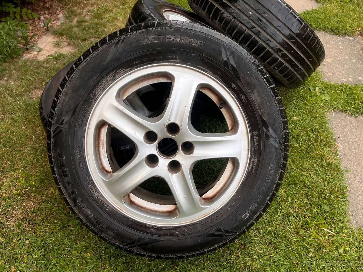 4x alu ze Škoda Octavia 1 na letních pneu Nokian 5-6mm 195/