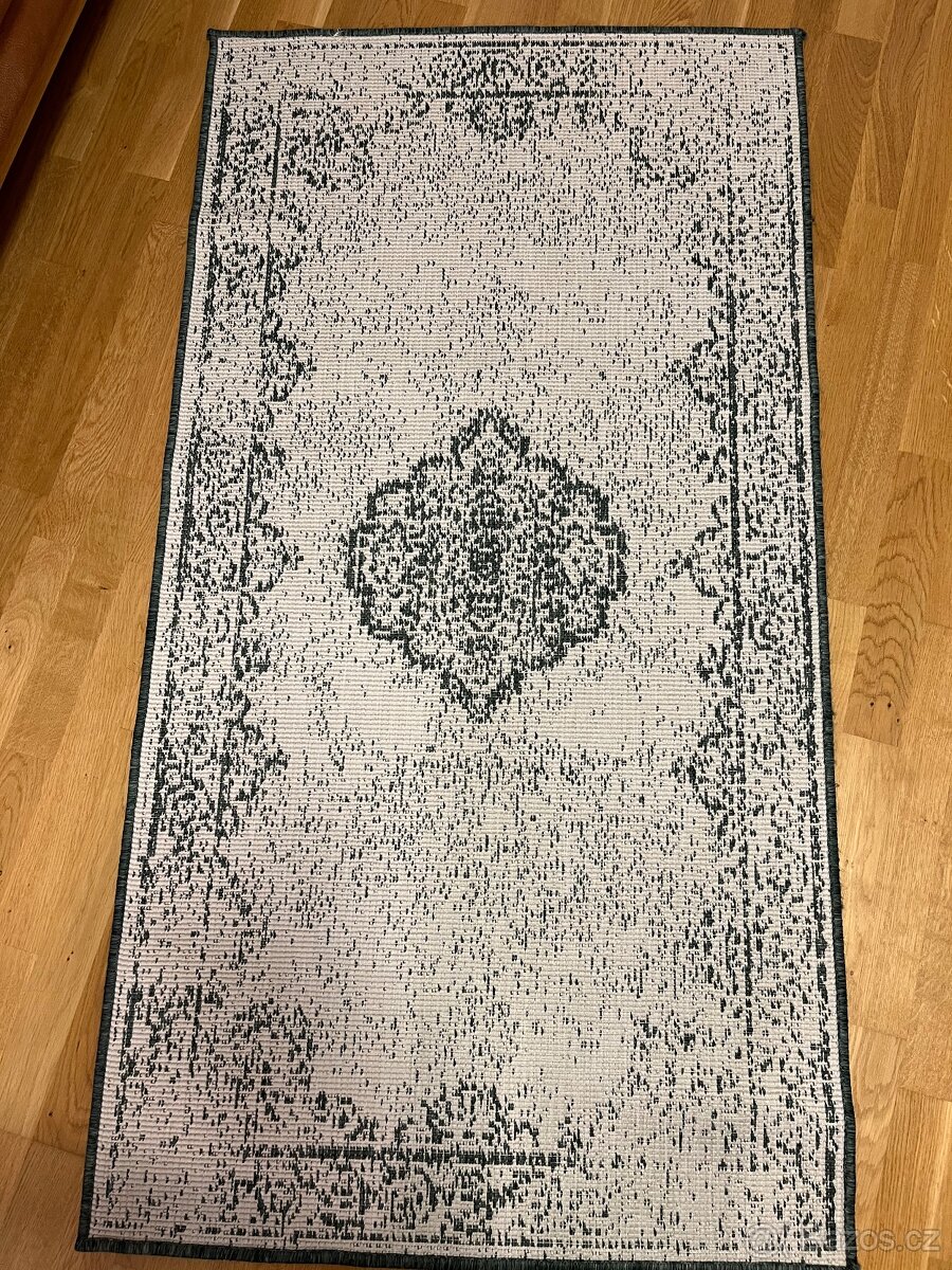 Oboustranný koberec