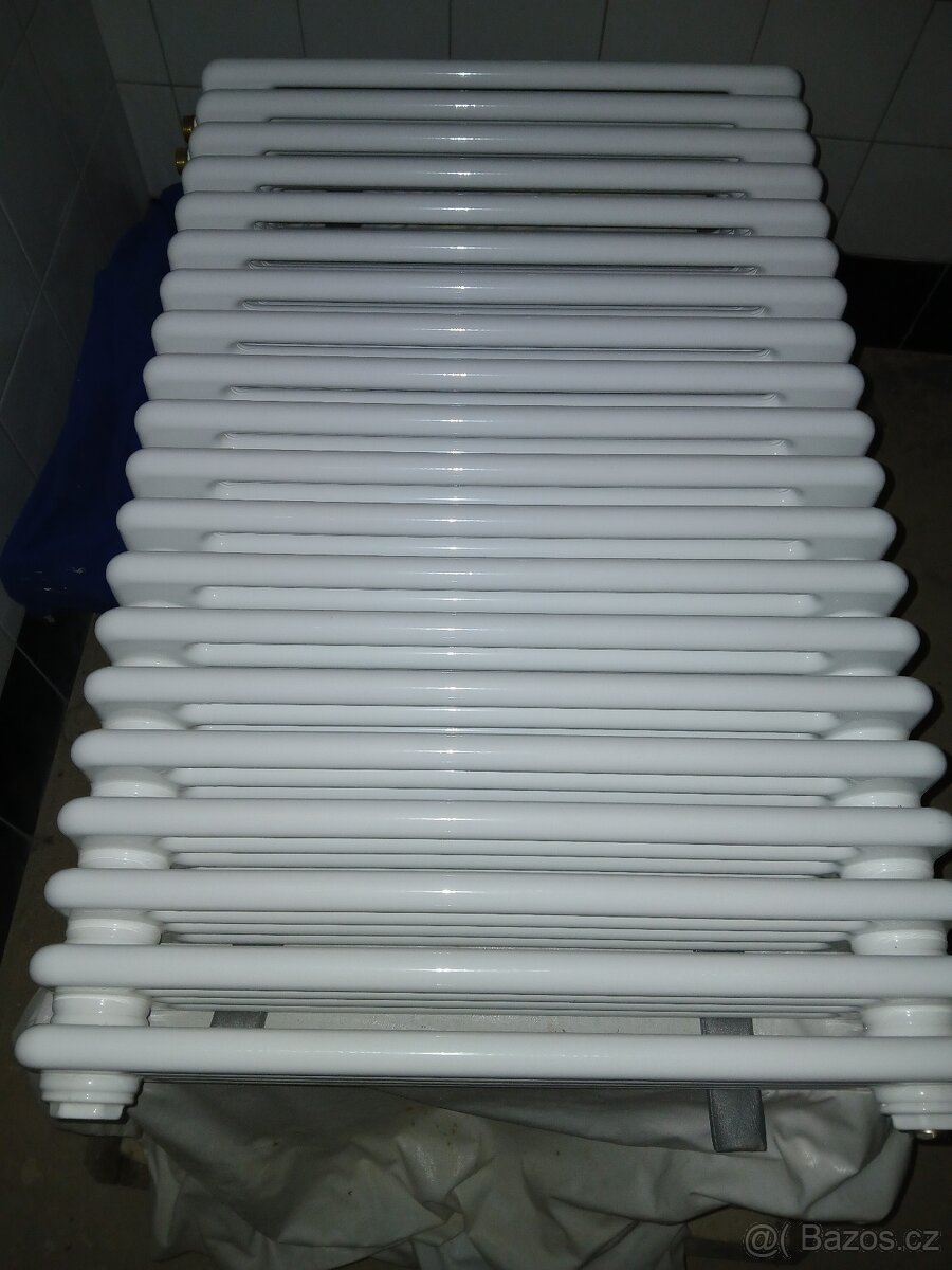 Litinový radiátor nová, 20článek,K dispozici 4 baterie. Cena