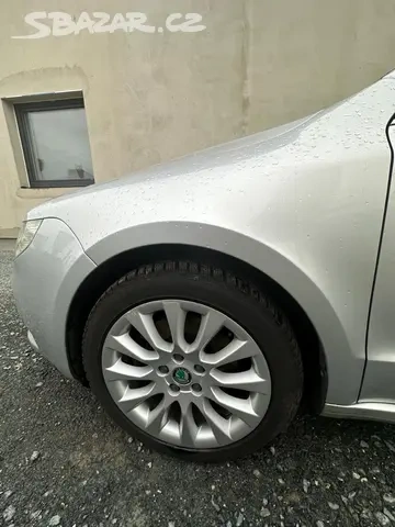 Levý blatník Škoda Superb 2 Superb II 2012 předfl