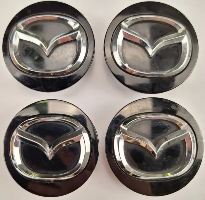 Originální středové krytky Mazda