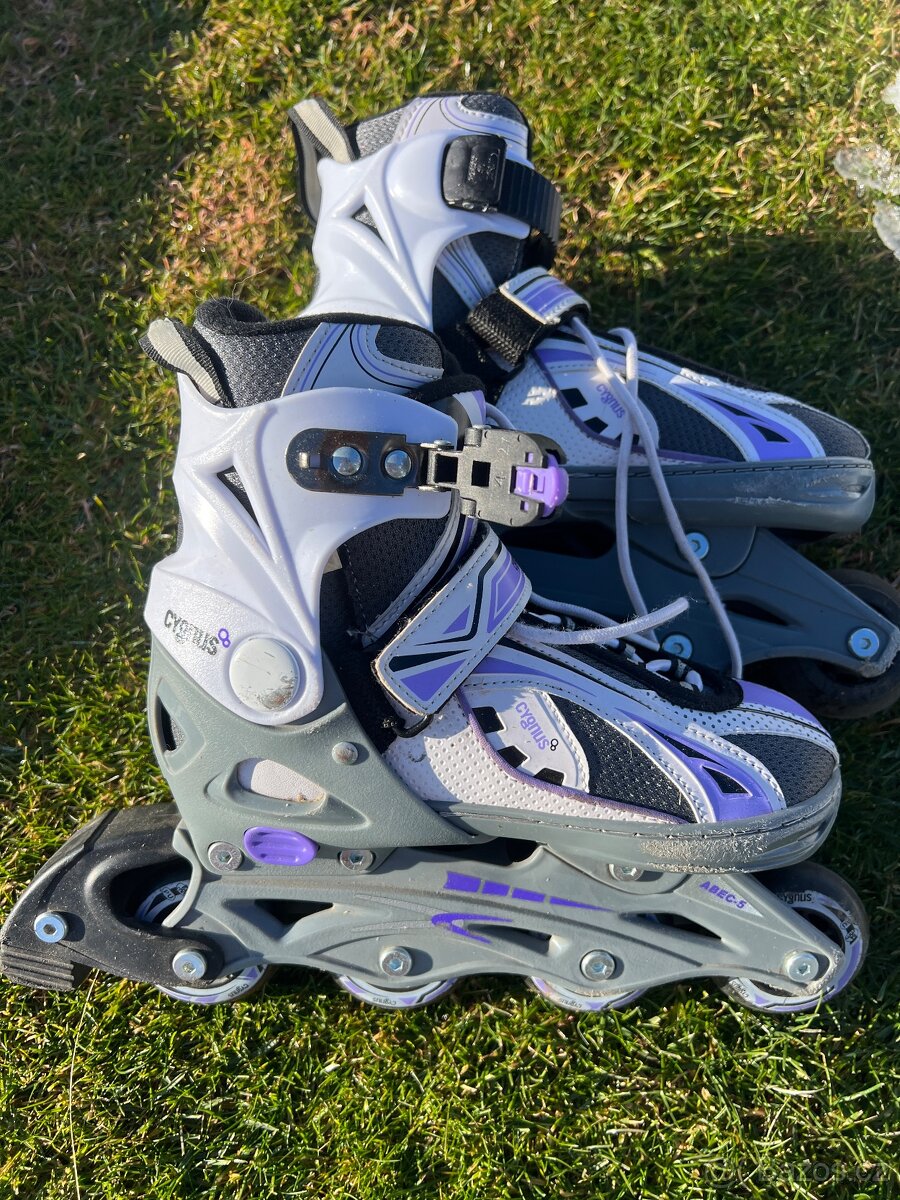 Prodám inline rostoucí kolečkové brusle vel. 32-35 EU