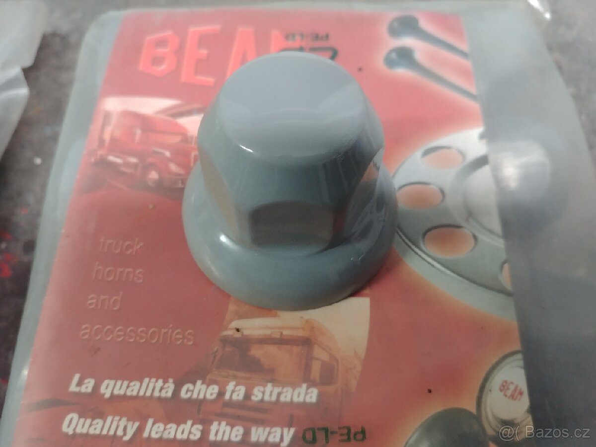 Kryt matice kola 33mm nízký - šedý plastový


