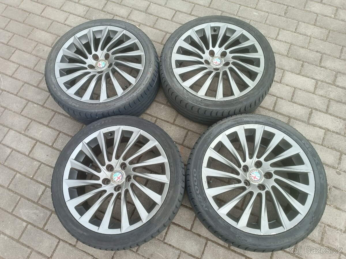 318. Originál kola Alfa Romeo 5x118 R18