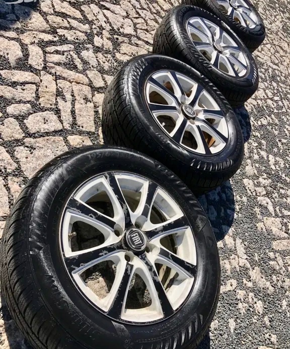 Alu kola rozteč 4x100 nejeté zimní pneu 195/65/15