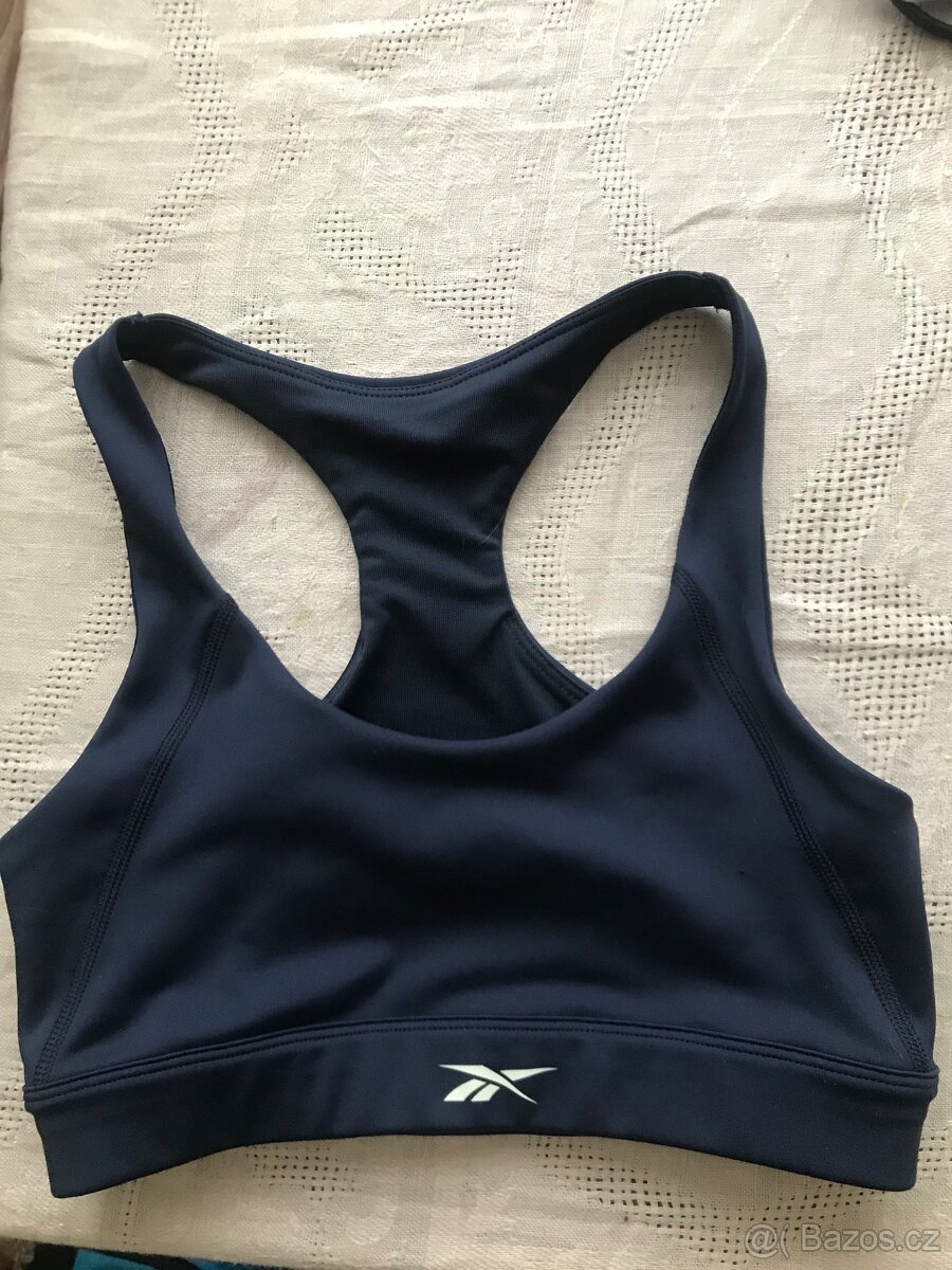 Dívčí modrá sportovní podprsenka Reebok, vel. 10-12 let