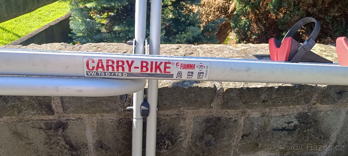 Nosič kola fiamma Carey. křídlové dveře