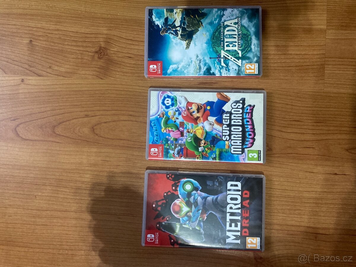 Nintendo switch lite + 3 hry