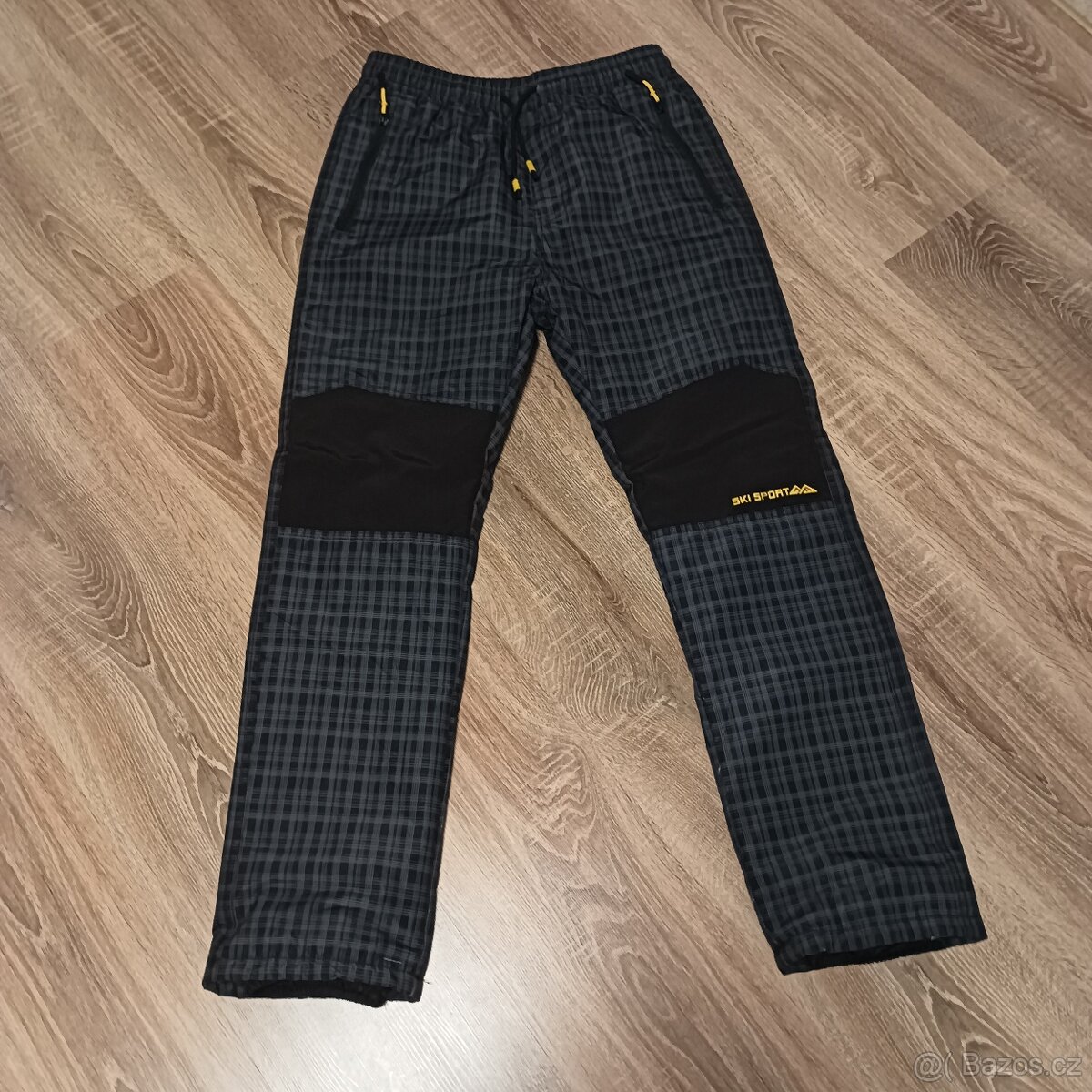 Zateplené šusťákové kalhoty