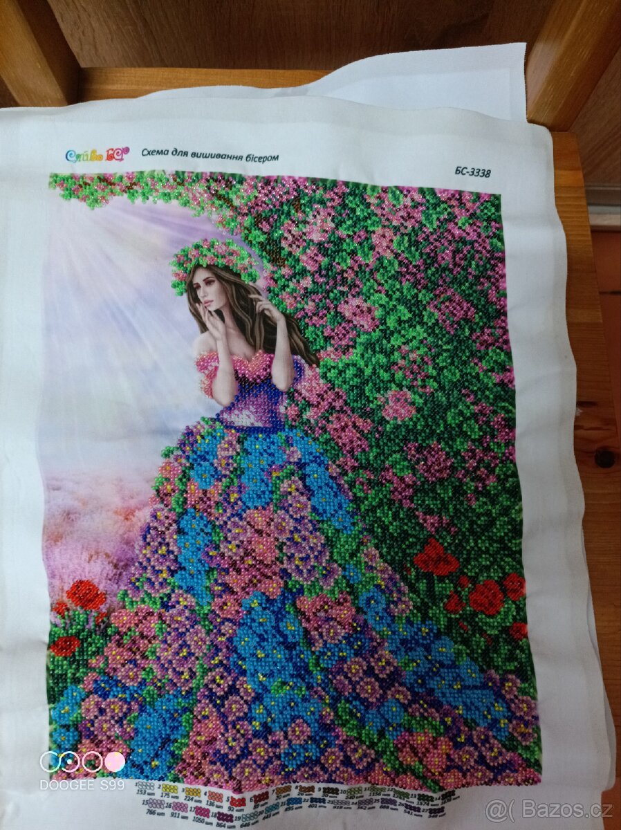 Obrázek je vyšívaný korálky, ruční práce.