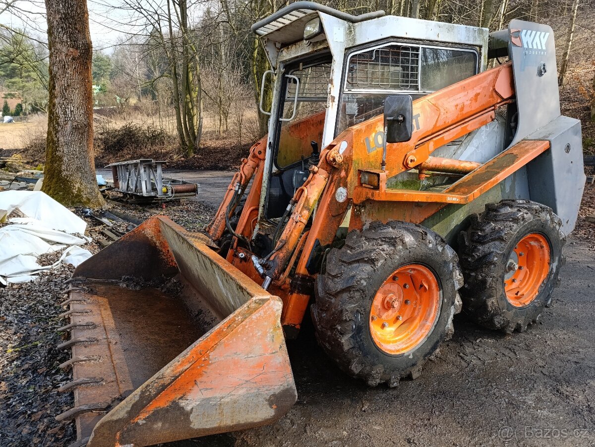 Smykový nakladač LOCUST 1203 KOUPĚ