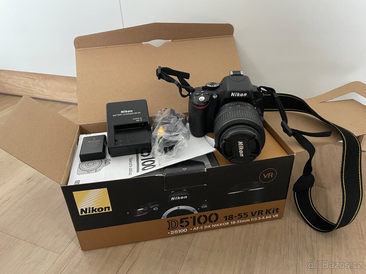 Nikon D5100 + 18-55 VR Kit