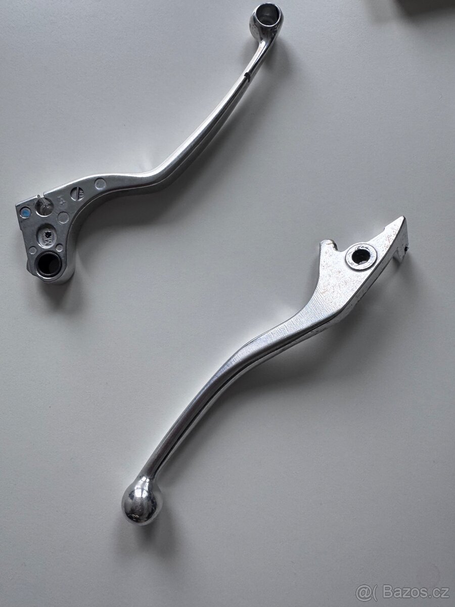 OEM páčky brzdy a spojky Honda CL500 2024 – téměř nepoužité,