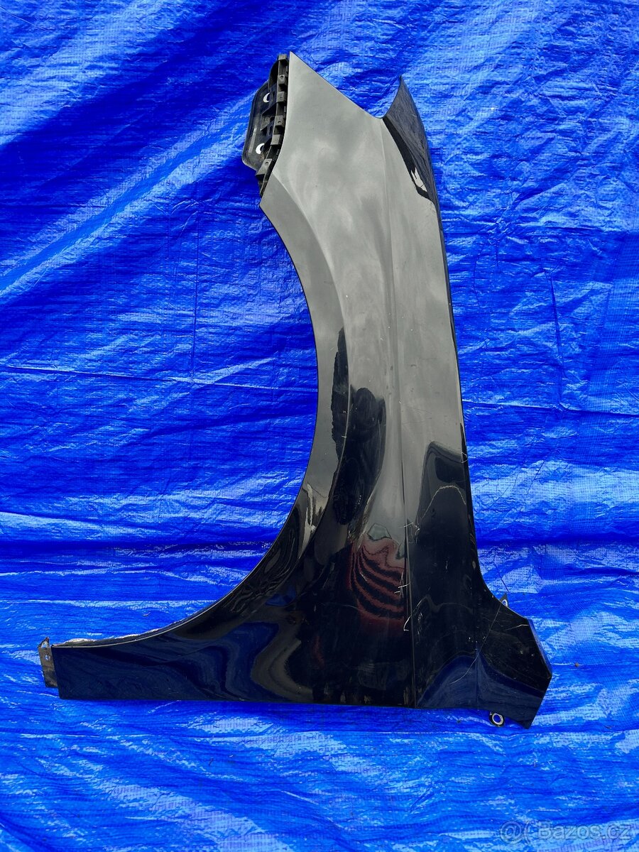 Levý přední blatník Passat B7