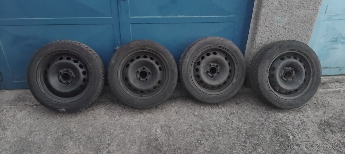 P: plechové disky Volvo S60 s pneu