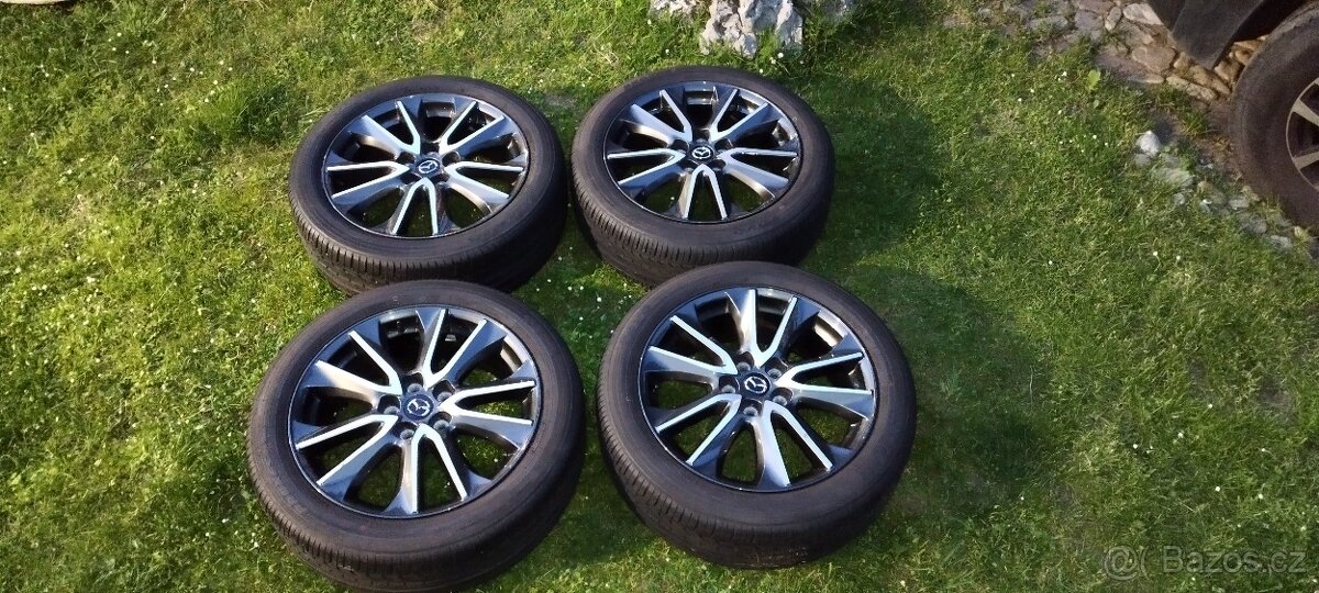 Alu sada kol Mazda 215/50 R18 letní top stav