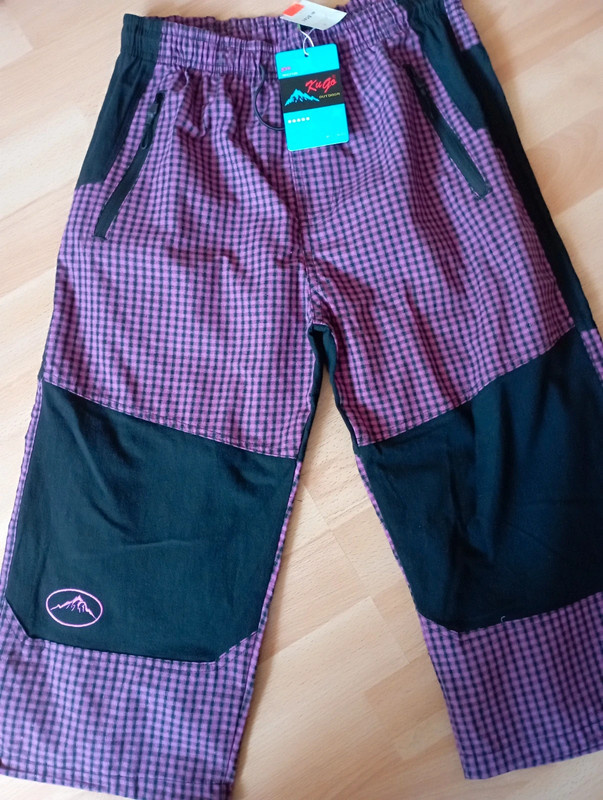 Kalhoty 3/4 plátěné Kugo vel. 152