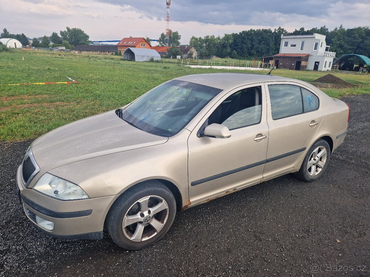 Škoda Octavia 1.9 tdi 77 kw - tempomat - digi klima -