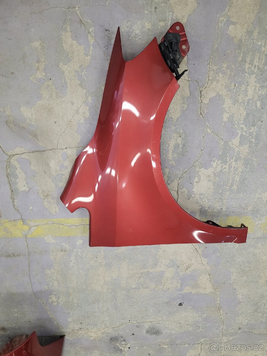 Pravý přední blatník Golf Plus